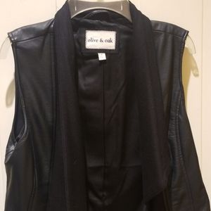 Black leather sleeveless jacket